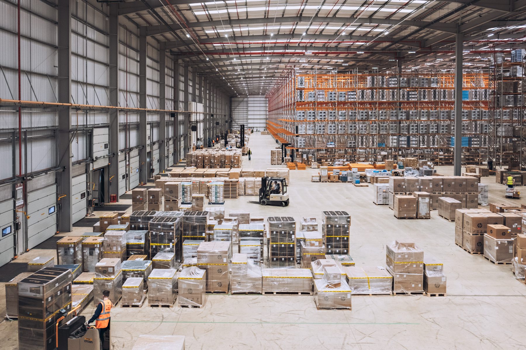 large warehouse with pallets of wrapped and boxed products