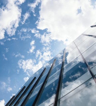 Modern,Building,Architecture,With,Blue,Sky,And,Clouds